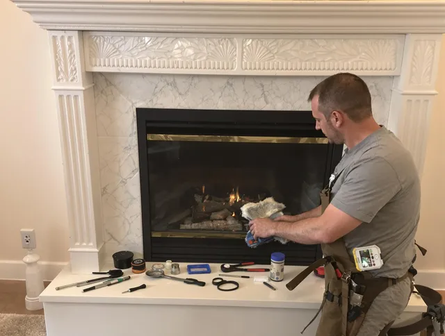 Jupiter Chimney Sweep performing fireplace maintenance in Jupiter, FL